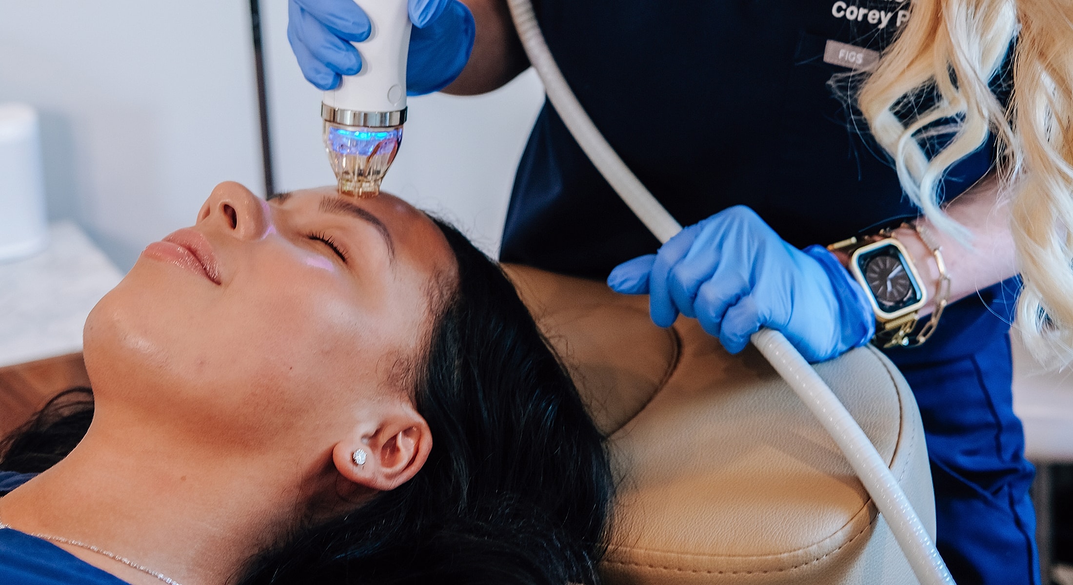 Facial treatment using a specialized device.